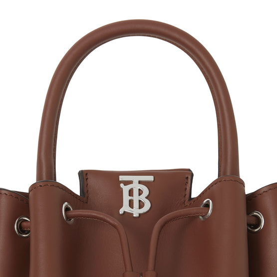 모노그램 모티프 레더 버킷 백 탠